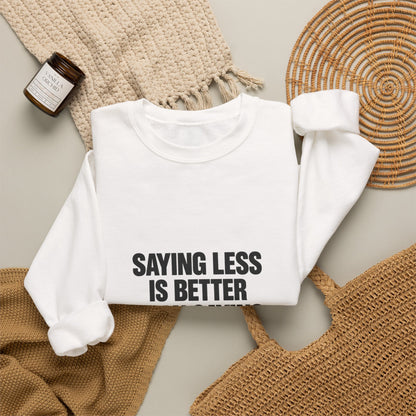 Crewneck Sweatshirt — "Saying Less Is Better Than Saying More" Minimal Quote